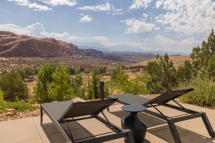 Outdoor patio with a desert mountain backdrop