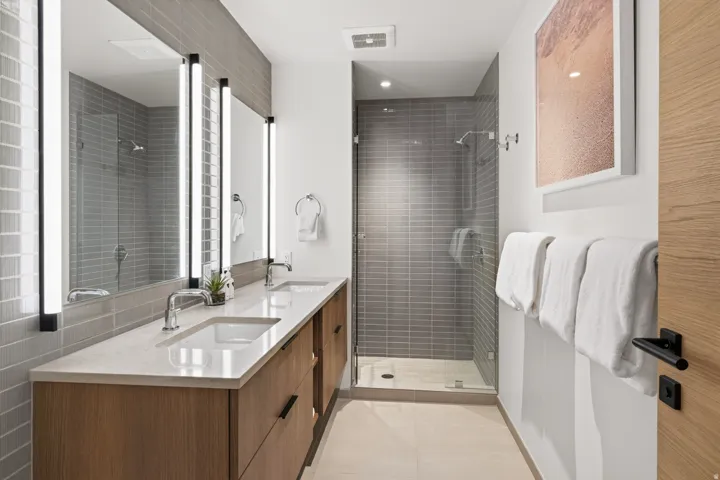 Dual vanity with integrated sinks and a light-toned countertop