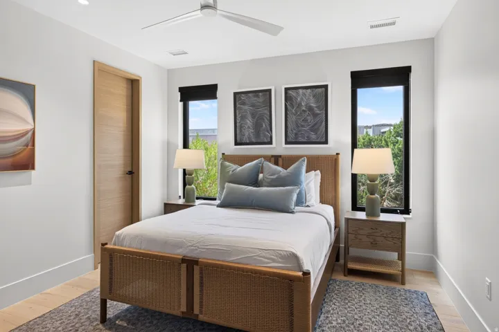 Room featuring wood-finish flooring, recessed lighting, and a ceiling fan