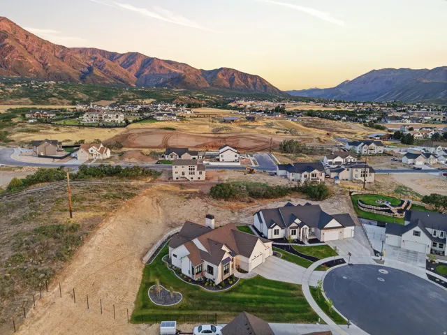 Newly constructed residential community with mountain backdrop