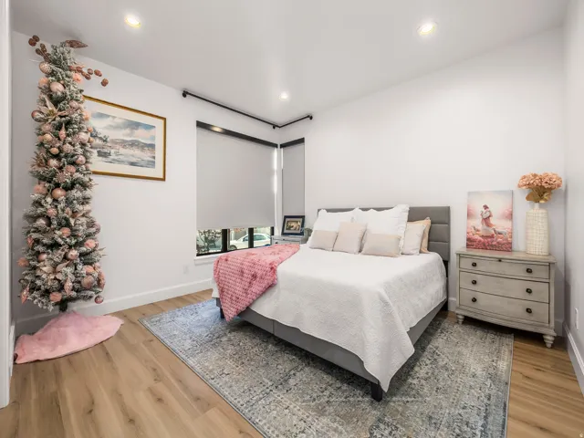 Wood-finish flooring complemented by recessed lighting