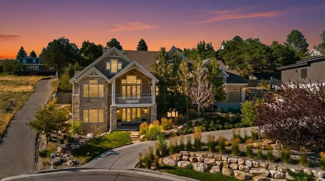 Stone and siding exterior with gabled roofline
