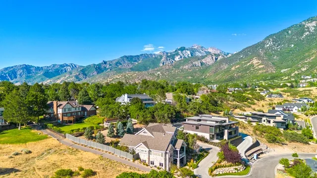 Mountain landscape with multiple residences showcasing varied architectural styles