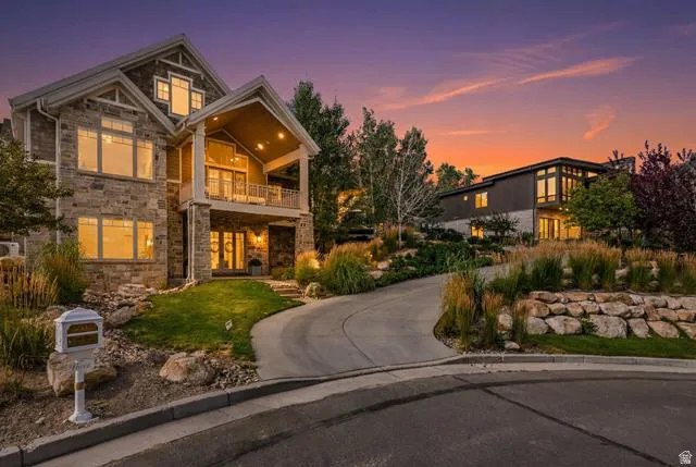 Stone and siding exterior with gabled roof lines