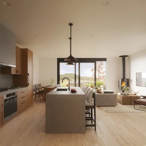 Open-concept living area featuring a large kitchen island with integrated sink, wood-finish flooring, a contemporary freestanding fireplace, and expansive sliding glass doors