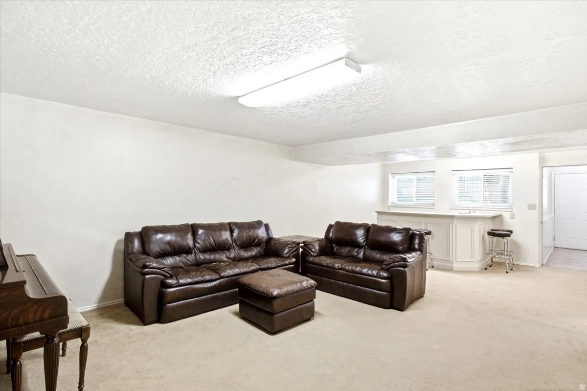 Large family room with kitchenette. Gas line plumbed in wall for future kitchen