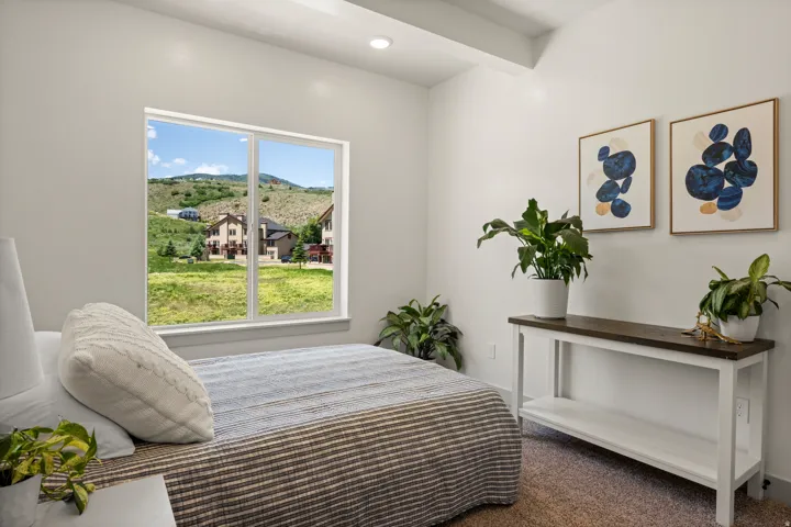 Large window framing hillside scenery
