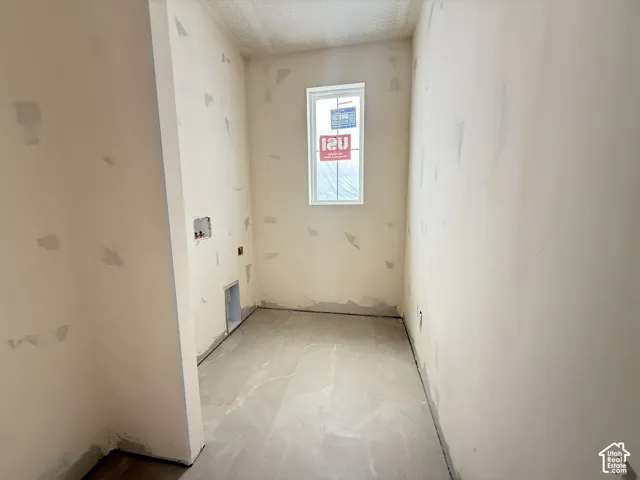 Laundry room: featuring natural light and shelving