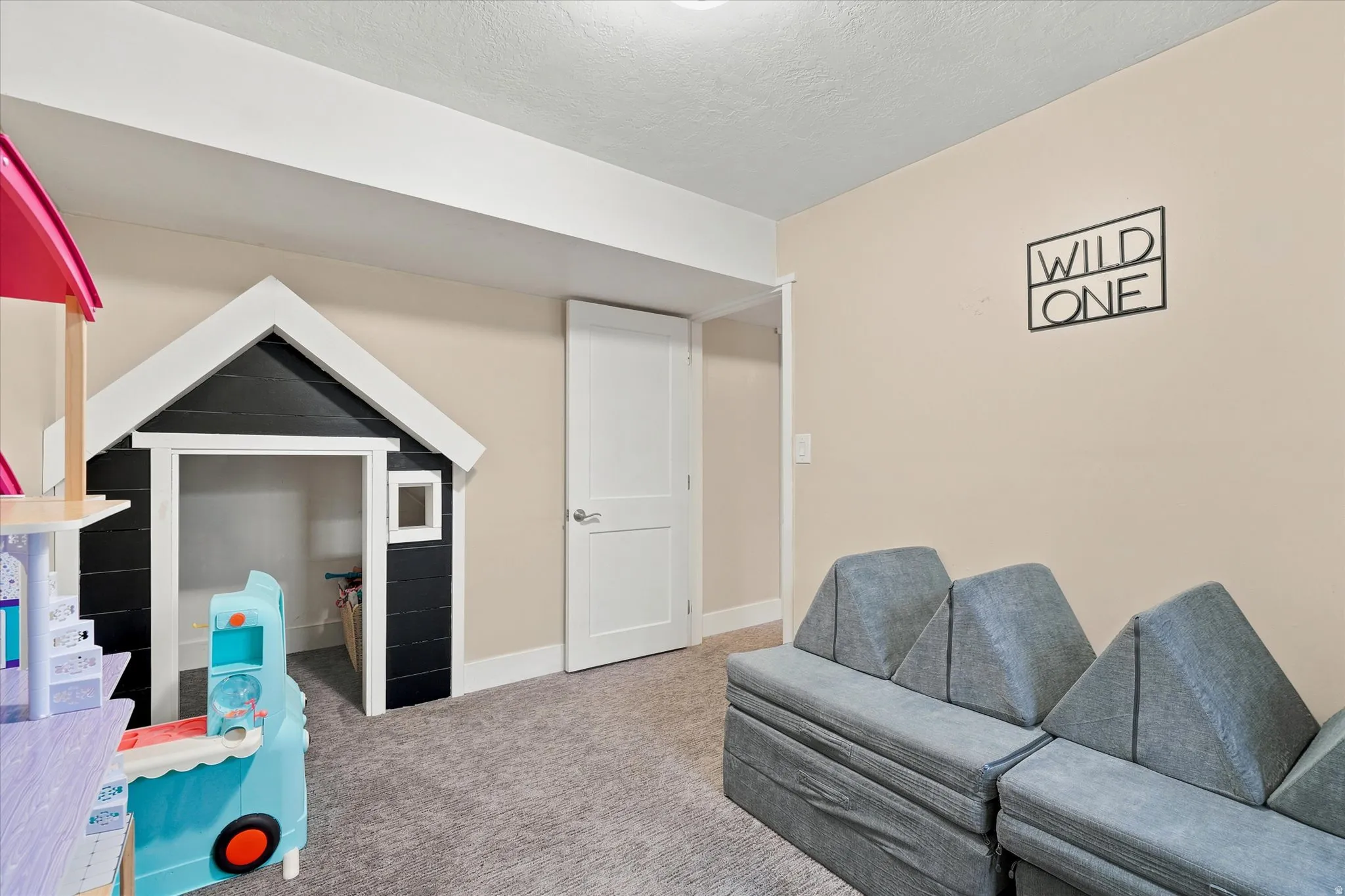 Dedicated room with recessed lighting and neutral wall tones