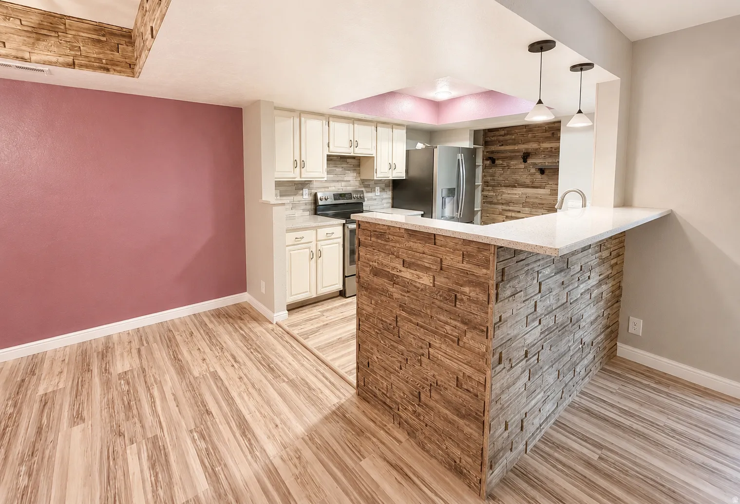 Convenient kitchen with bar seating and large pantry