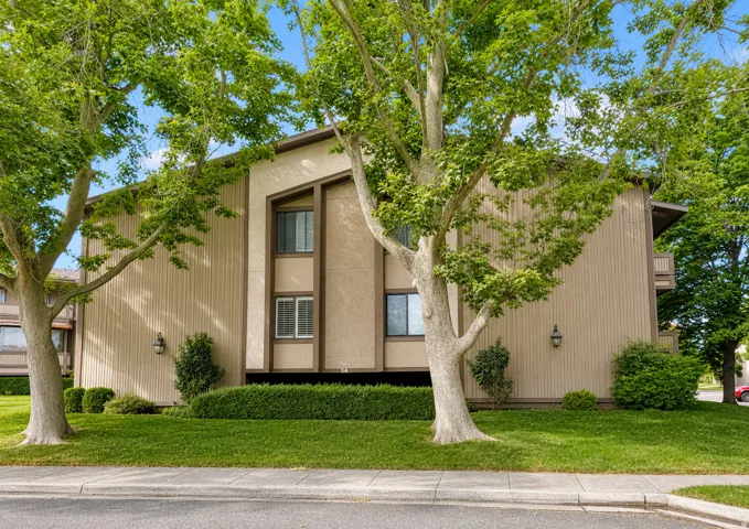 Top level condo conveniently located right across the street from community pool