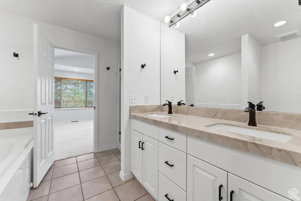 Double vanity with integrated sinks and stone-finish countertop