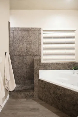Walk-in shower with separate jetted tub