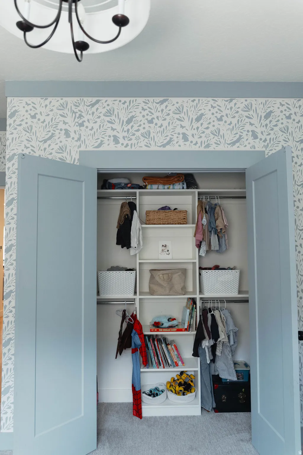 Built-in closet system featuring shelving and hanging rods