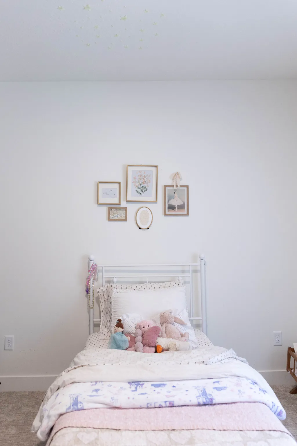 White painted walls with light-toned carpet flooring