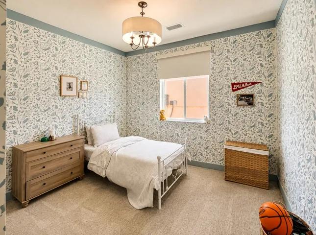 Patterned wall covering with a contrasting trim accent