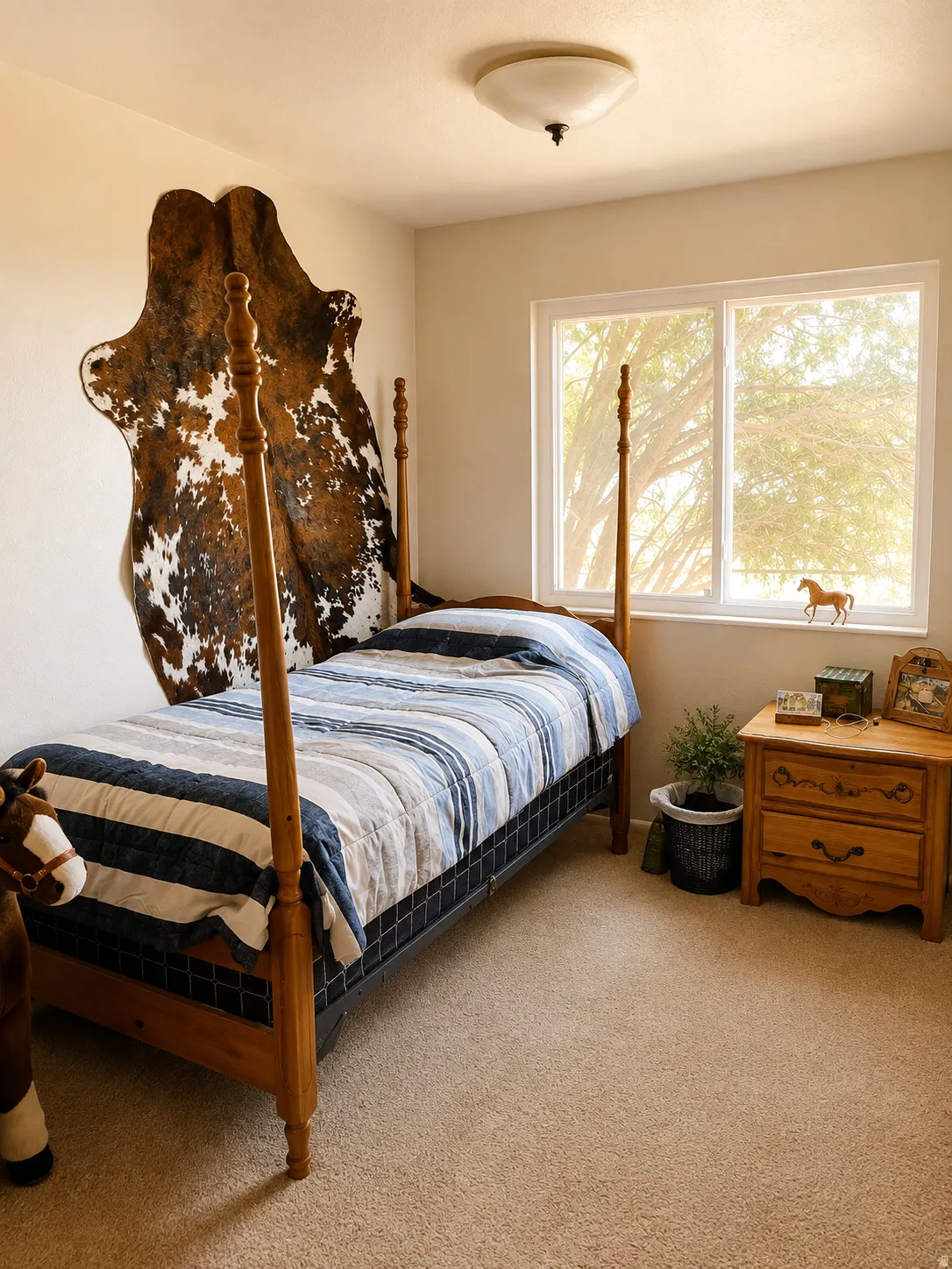 Carpeted room with a double-pane window, flush-mount ceiling light, and light-toned walls