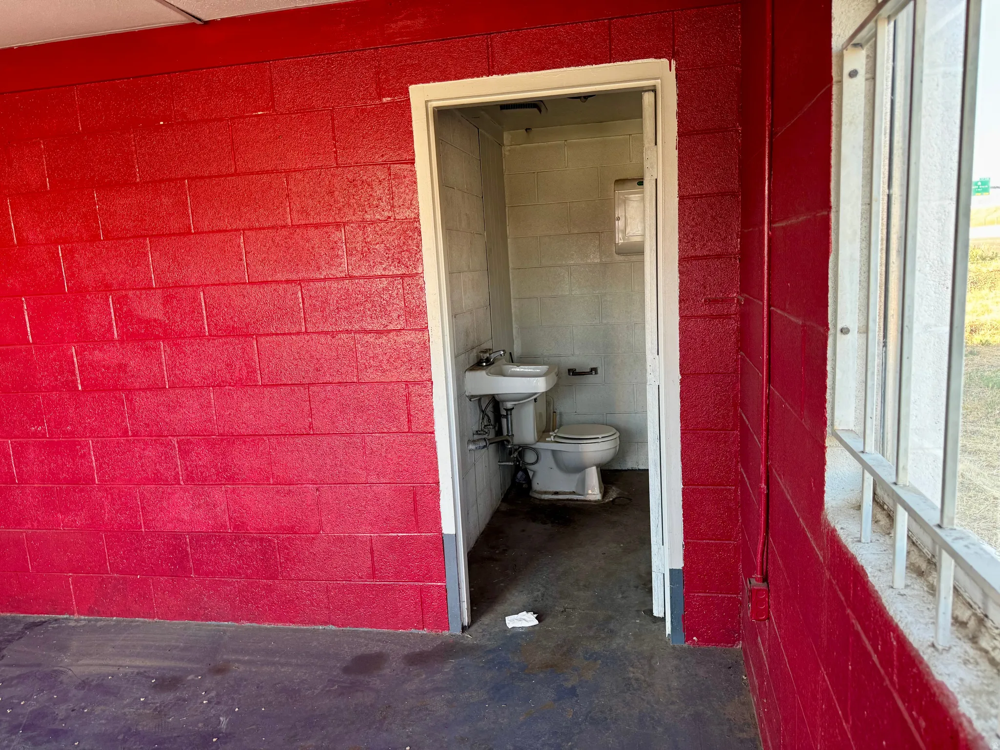 Red painted cinder block walls