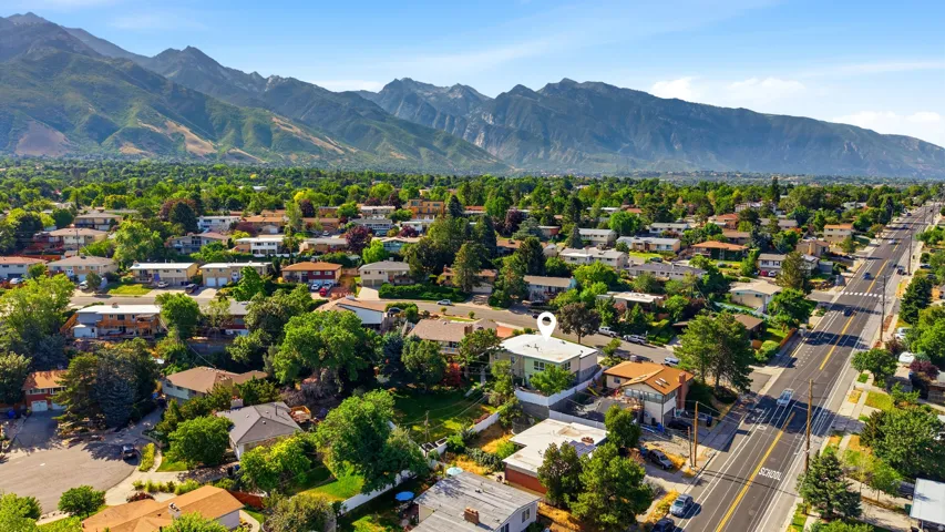 Residential property with a prominent mountain backdrop