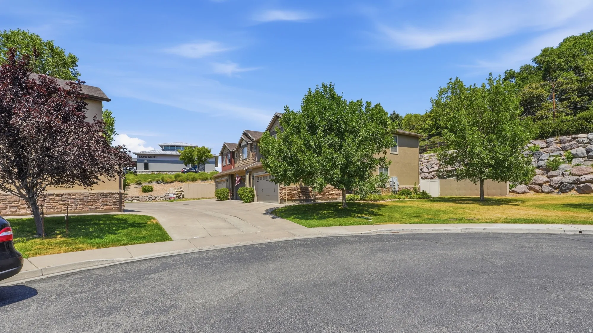 Two-story residential structures with attached garages
