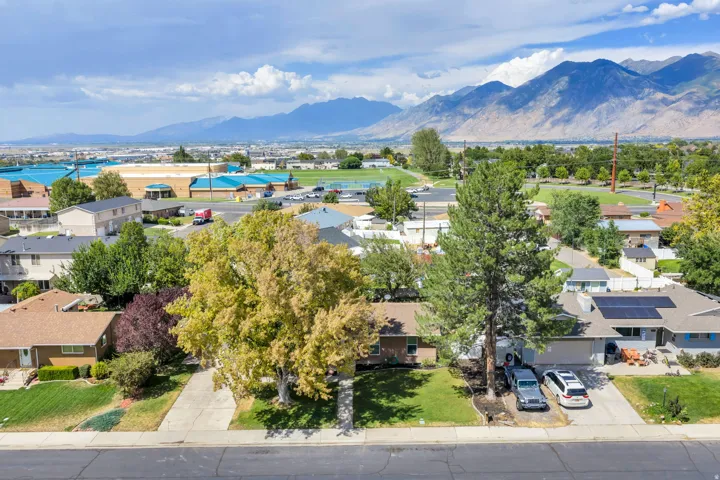 Mountain range backdrop framing the urban landscape