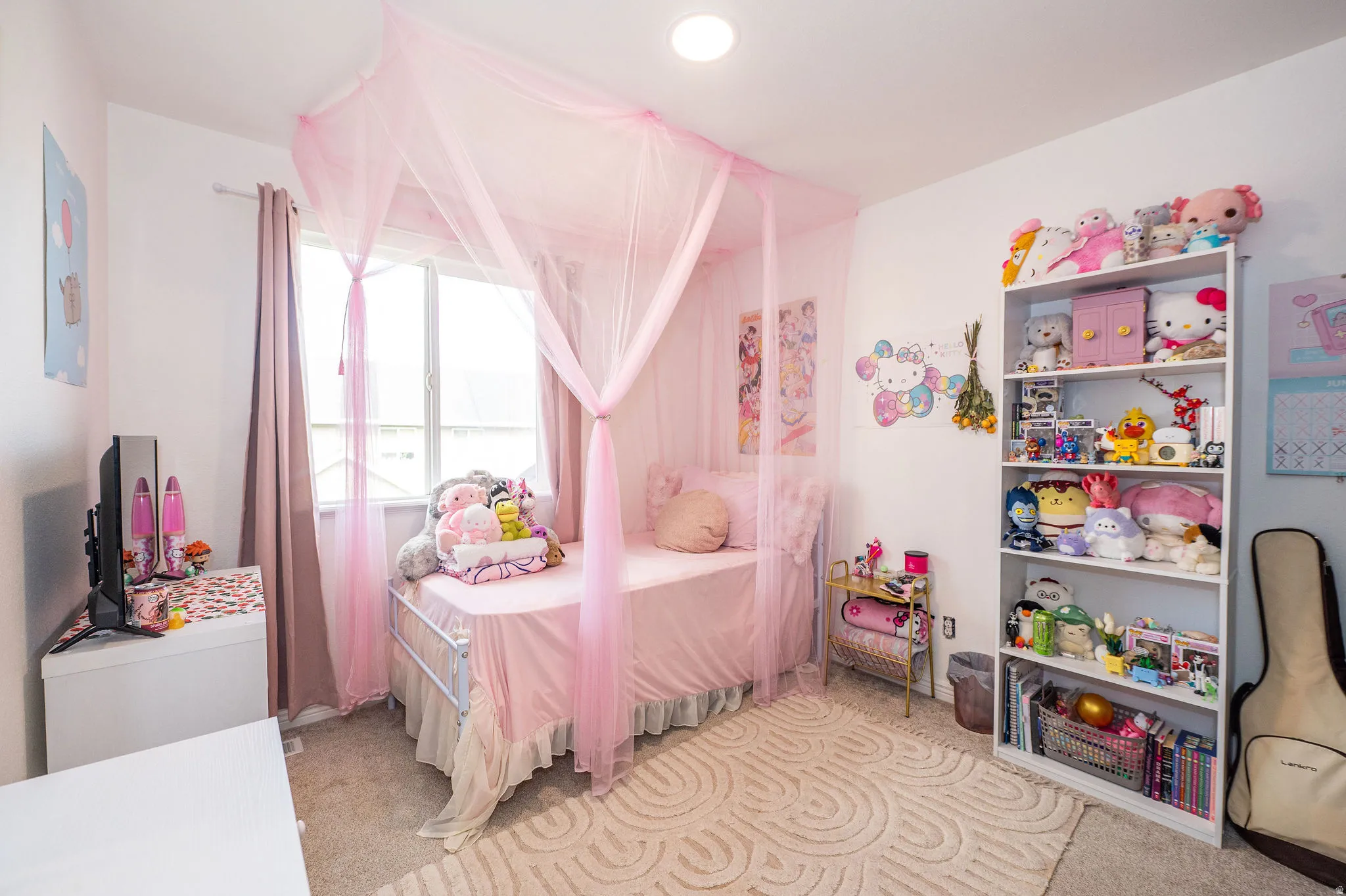 Carpeted room featuring a double window, recessed ceiling lighting,