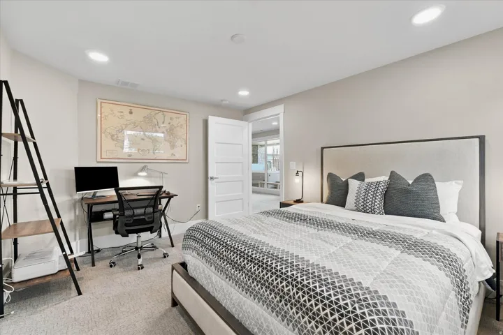 Carpeted bedroom featuring recessed lighting and neutral wall tones