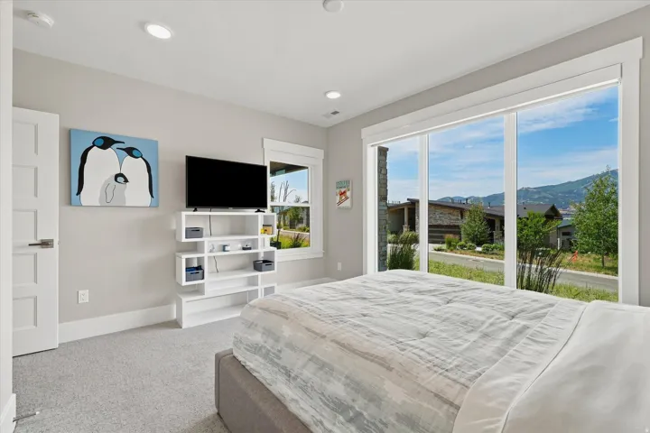 Expansive sliding glass doors showcasing mountain scenery