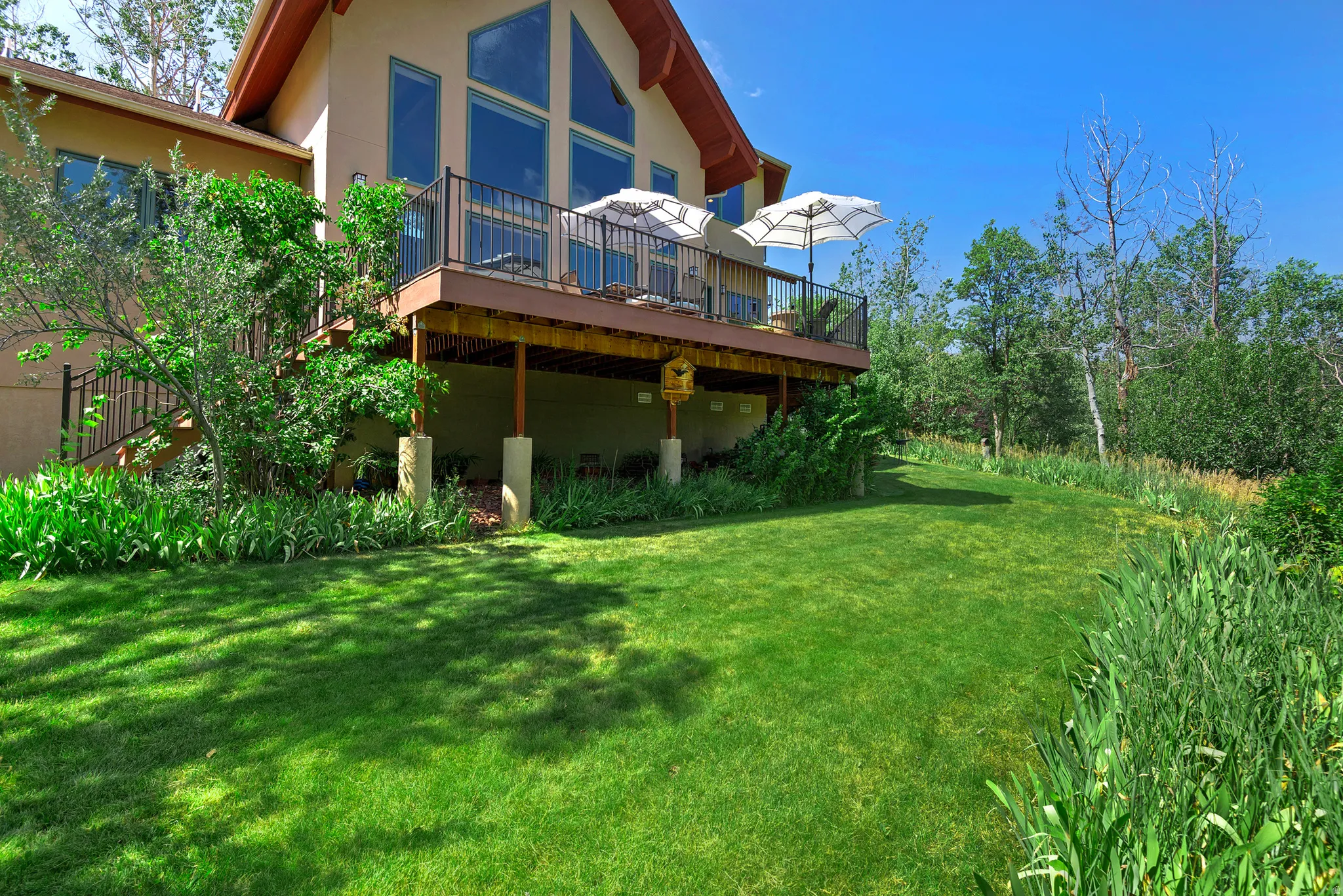 Expansive rear deck with dark railing system