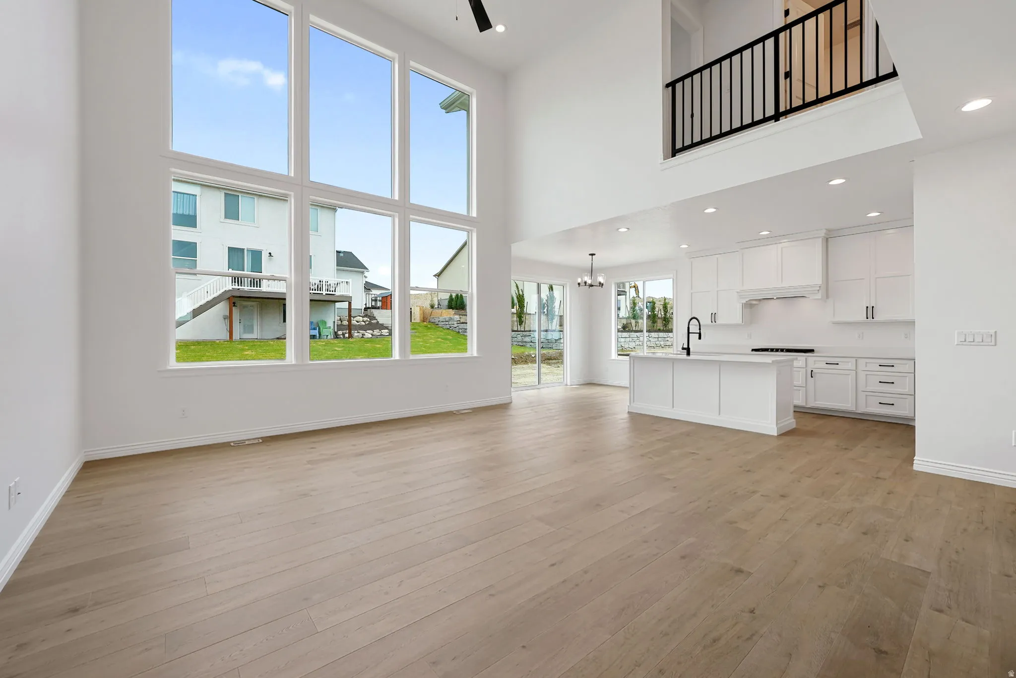 Two-story living area with expansive window wall