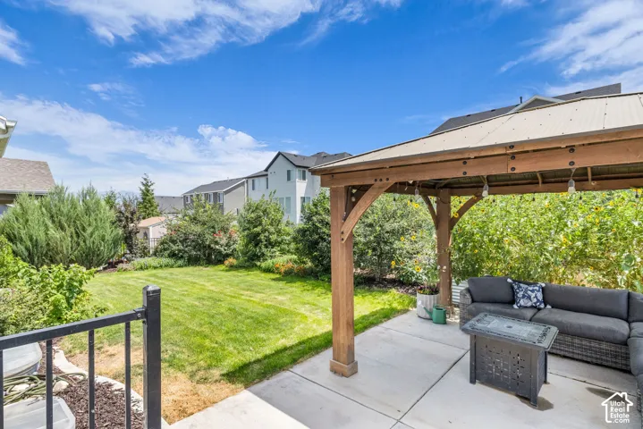 Expansive backyard featuring a lush lawn and established perimeter landscaping