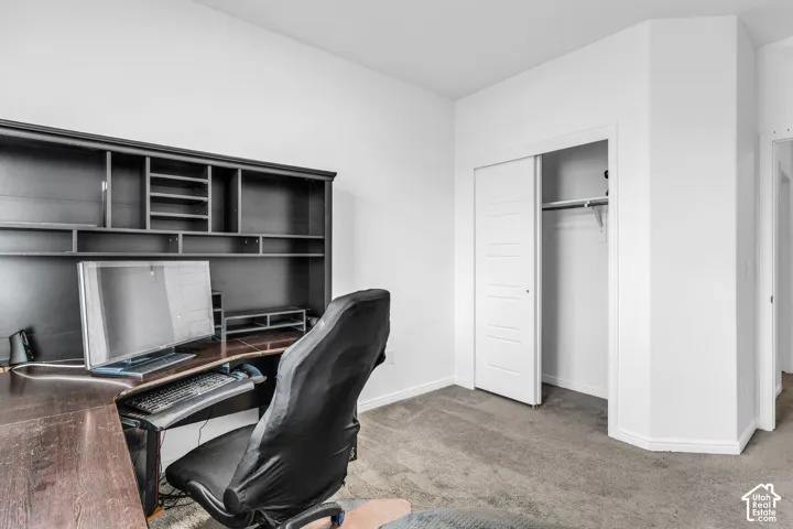 Neutral wall colors with carpet flooring throughout
