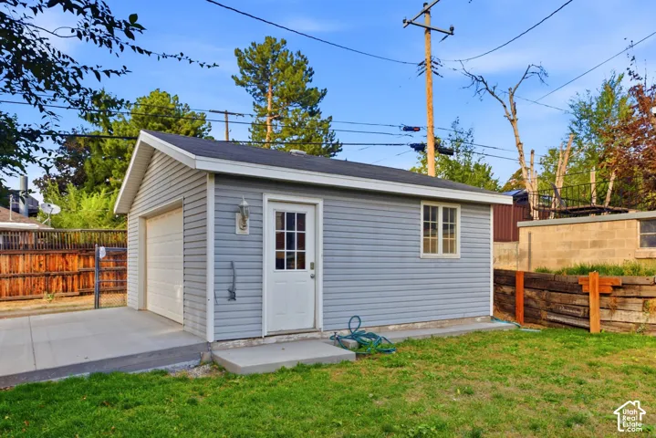 Detached 2 car garage complete with it's own power panel and 220v ready for your electric car.