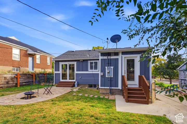 Blue siding exterior with white trim