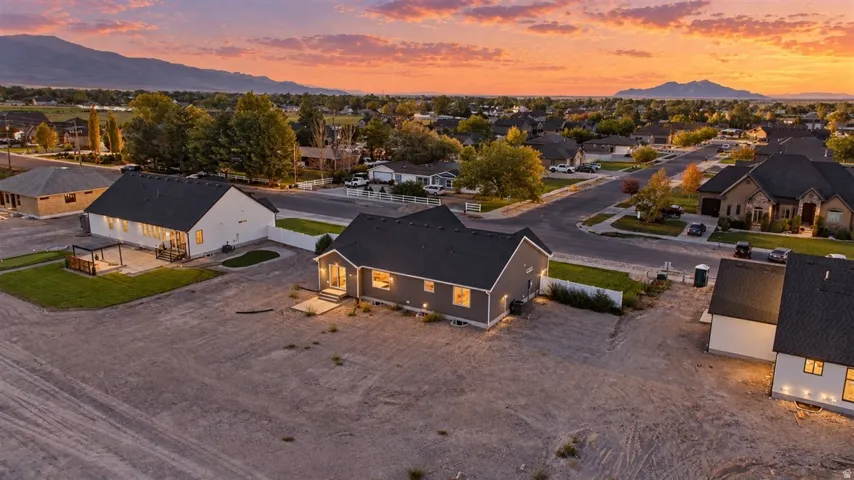Mountain backdrop, residential street, and a newly constructed neighborhood