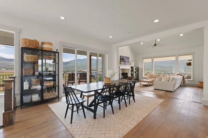 Open-concept living area with wood-finish flooring