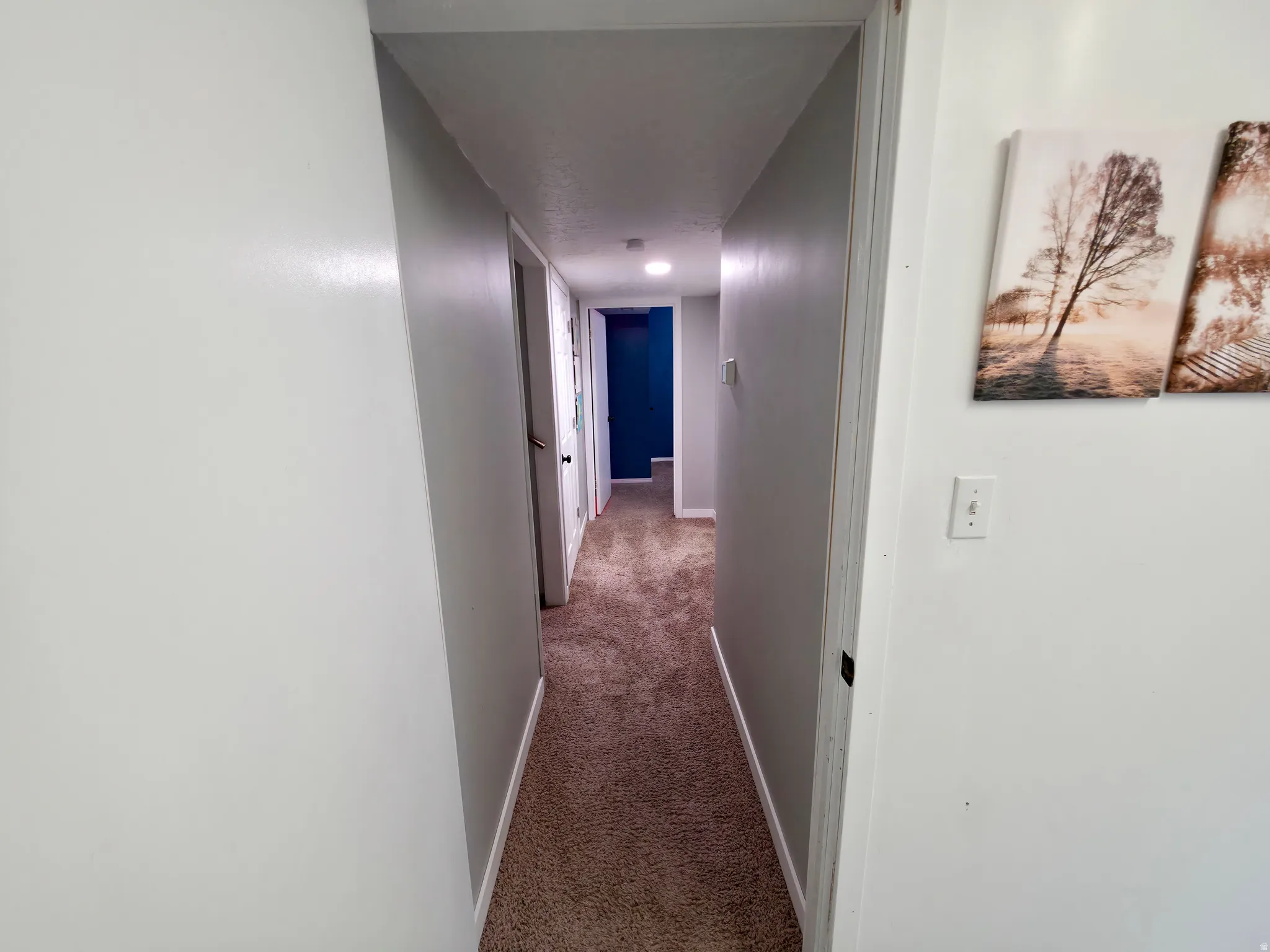 Up and down stairs on left. Bedroom 4 at center. Bathroom 2 on right.