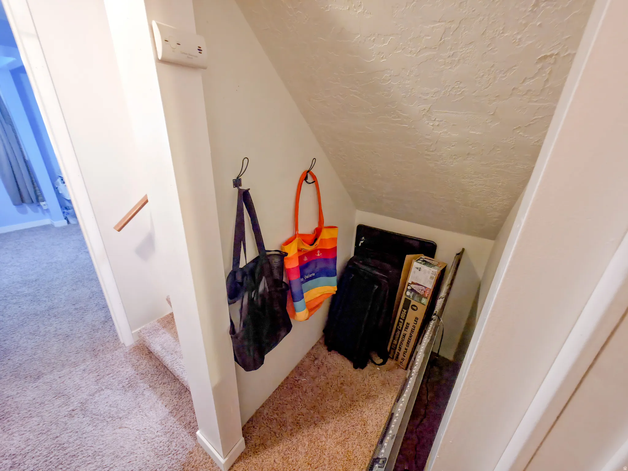 Under-stair alcove for storage.