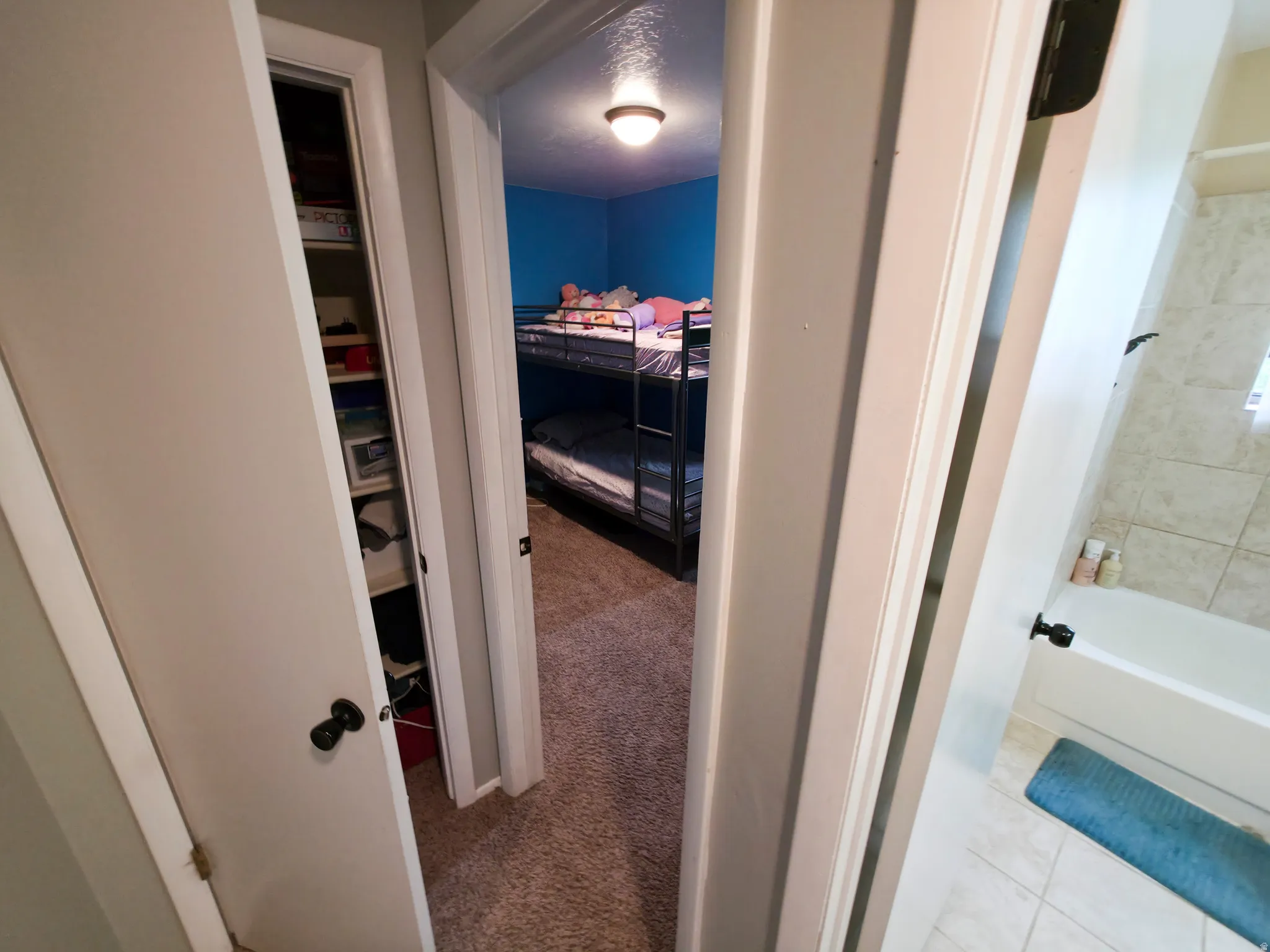 Linen closet on left bedroom 2 at center. Bathroom 1 on right.
