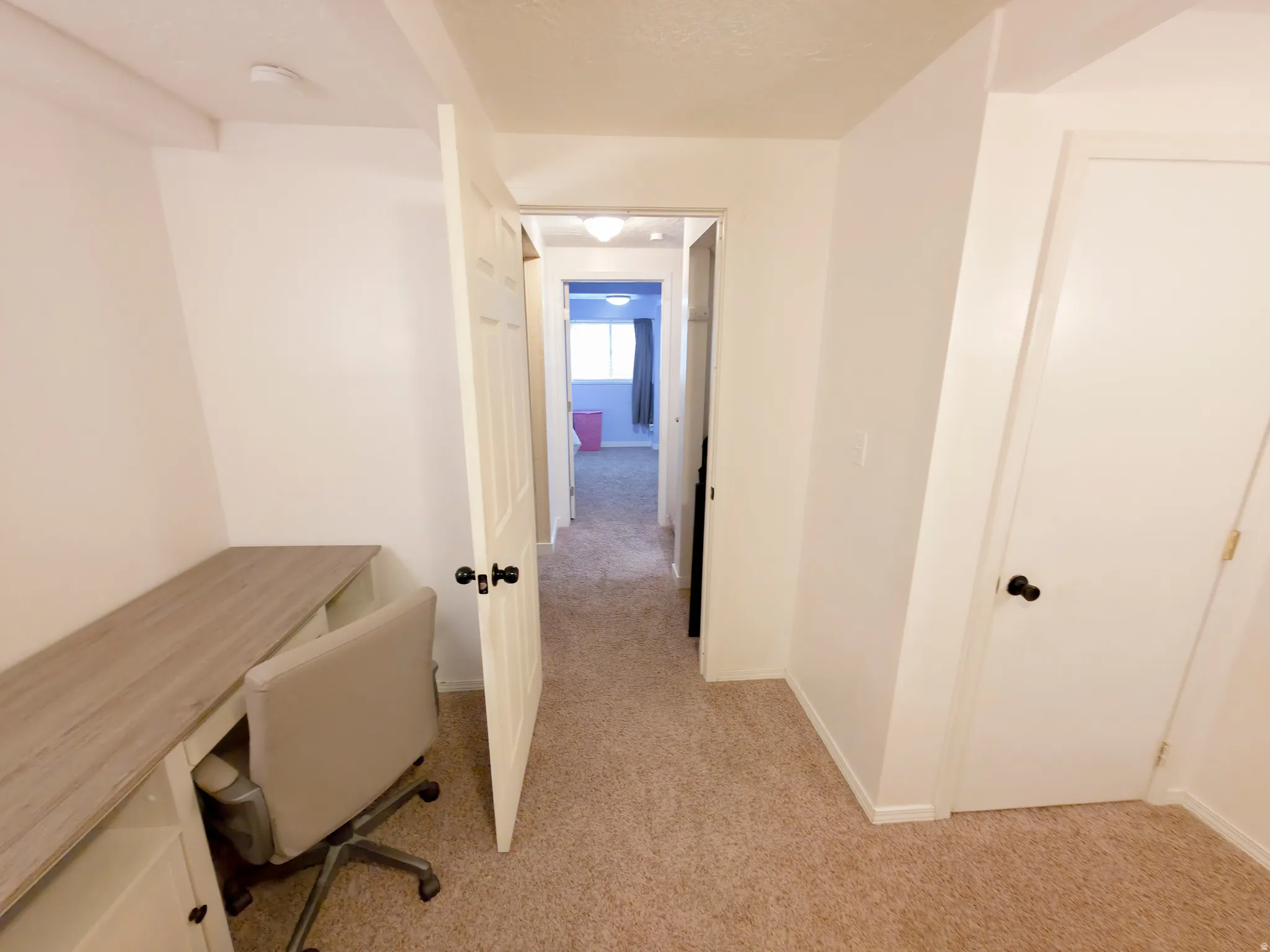 Hallway center, closet on right.