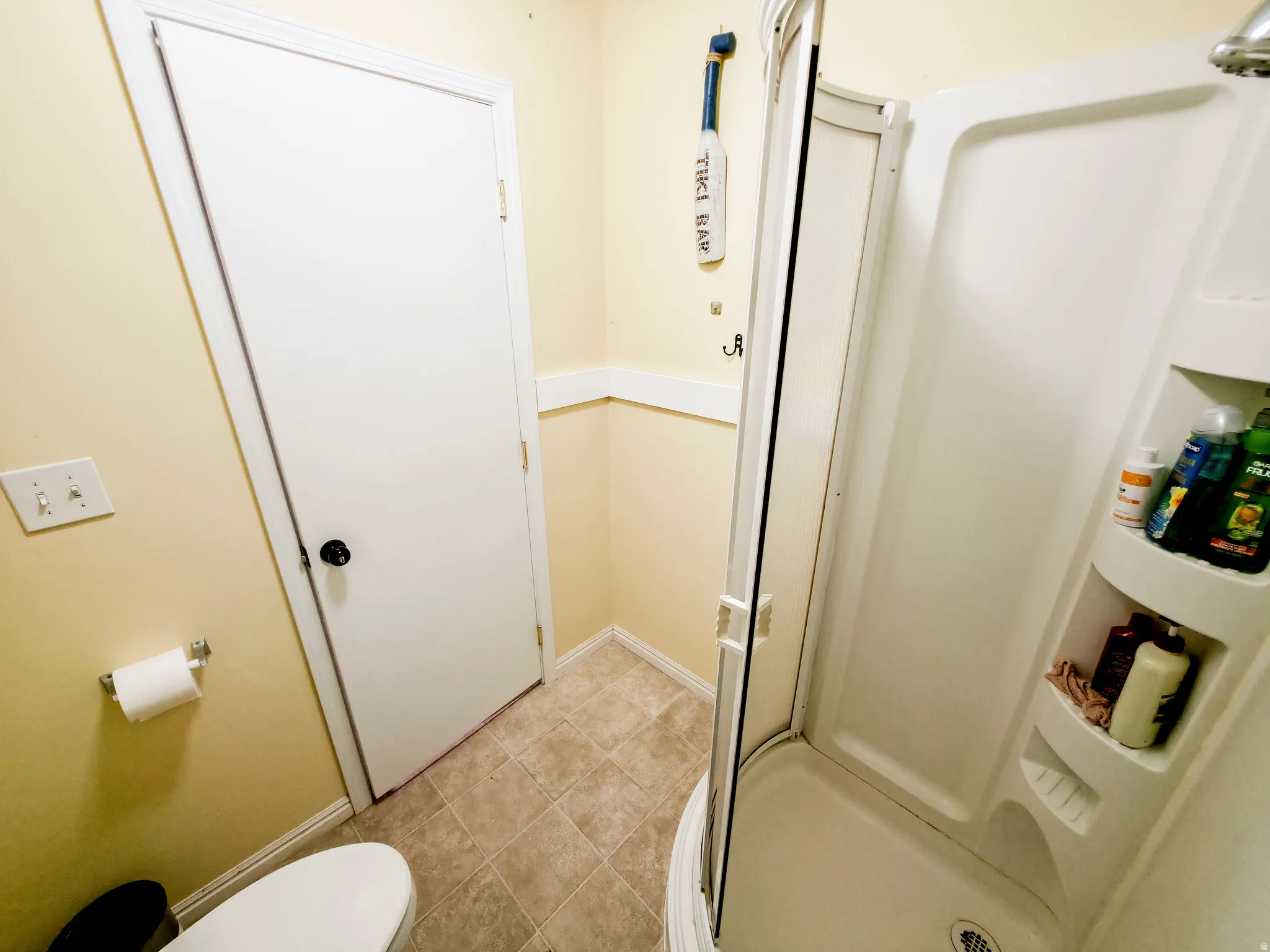 Bathroom 2 with corner shower.