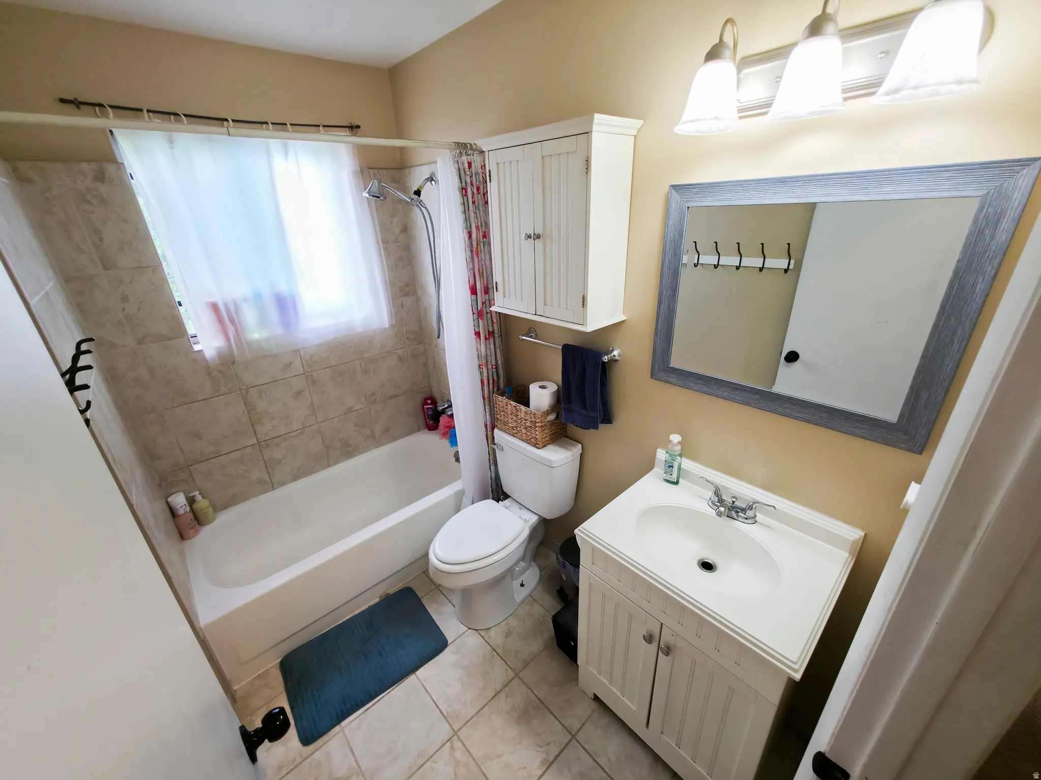 Bathroom 1: Tile & updates.
