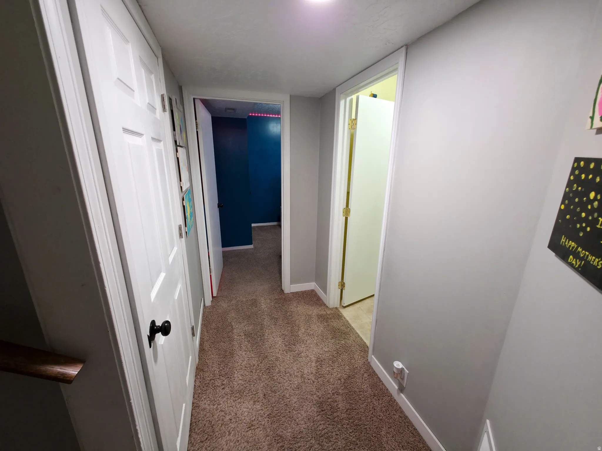 Stairs to basement 2 at left. Bedroom 4 center. Bathroom 2 on right.
