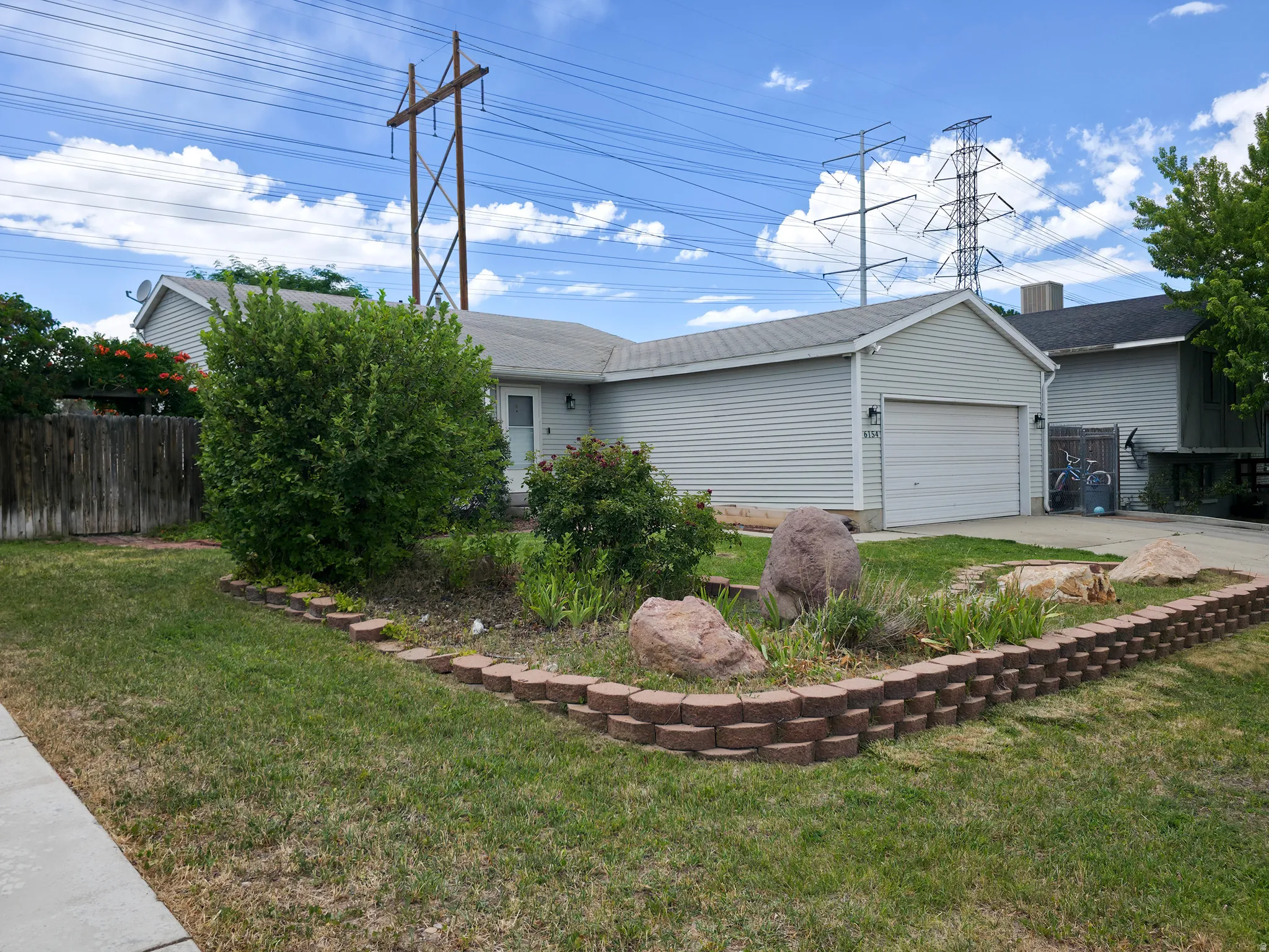 Terraced front yard with garden.