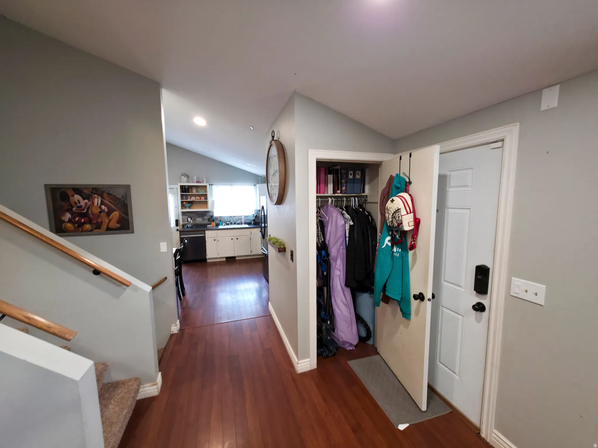Coat closet in entry.
