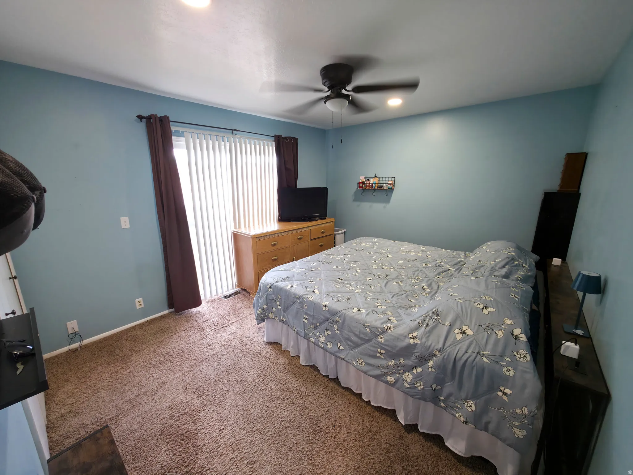 Primary bedroom. Sliding glass door view.
