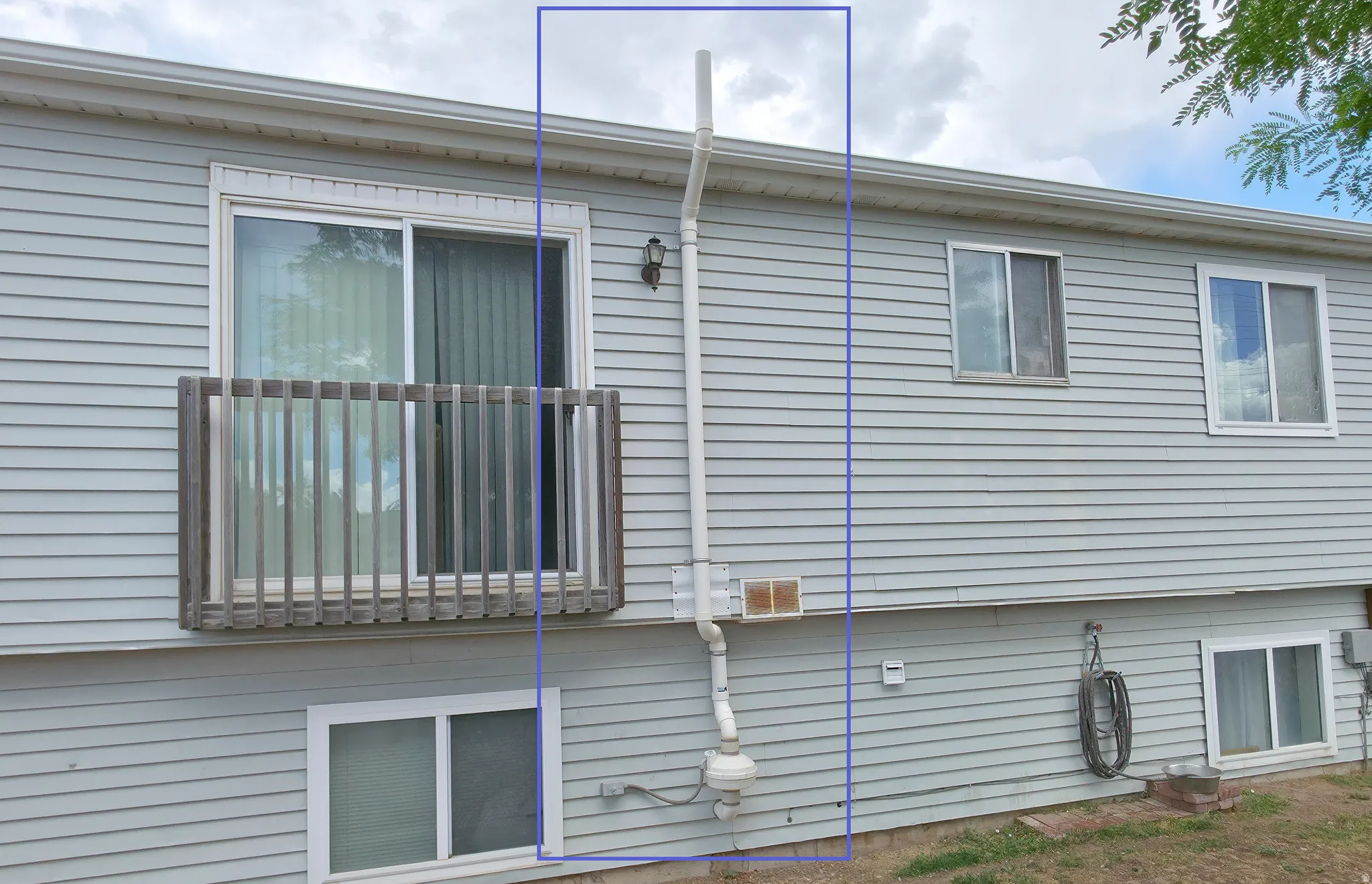 Back yard: radon system vents above roof line.