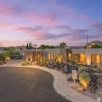 Contemporary exterior architecture with stone accents and stucco finishes