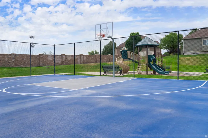 Basketball court next to Pool