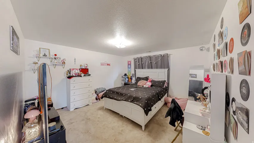 Bright interior space with light-colored carpeting and white walls
